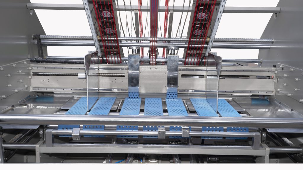 Feeding System for Bottom Paper