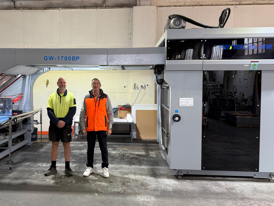 (l-r) PMS Lithography’s Ermano Destito and Theo Prosenica with the Fengchi GW1700 litho laminating machine